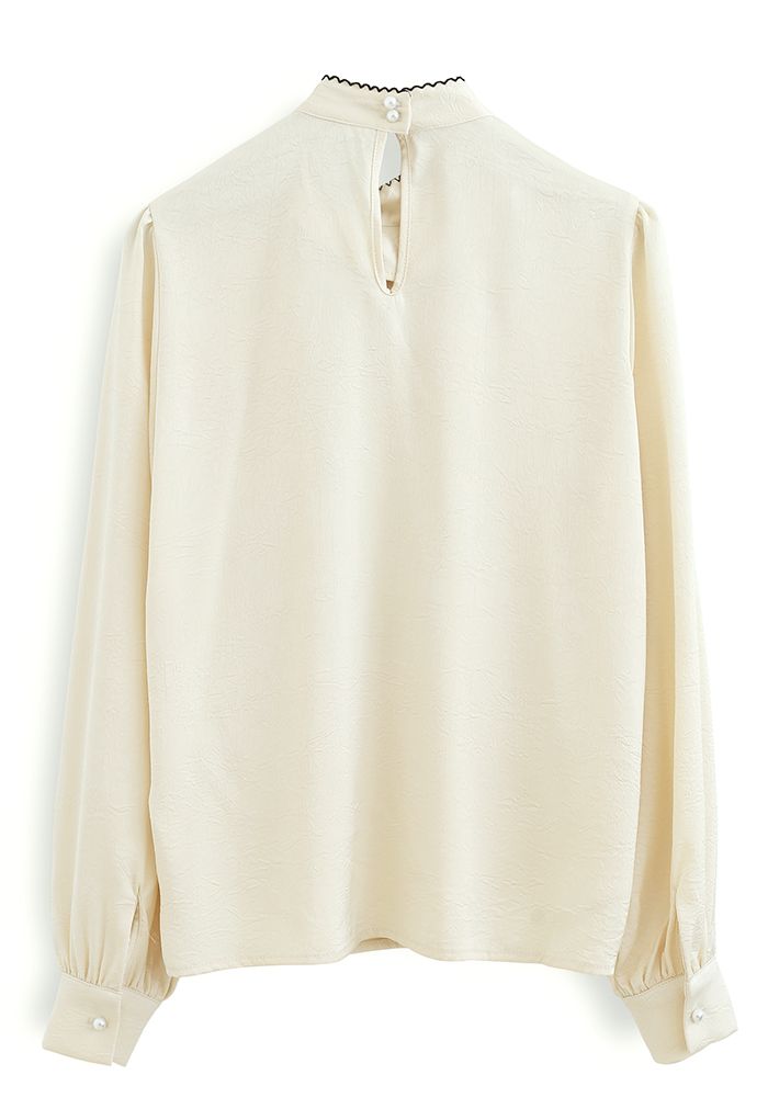 Seamed Edge Bowknot Textured Satin Top in Cream