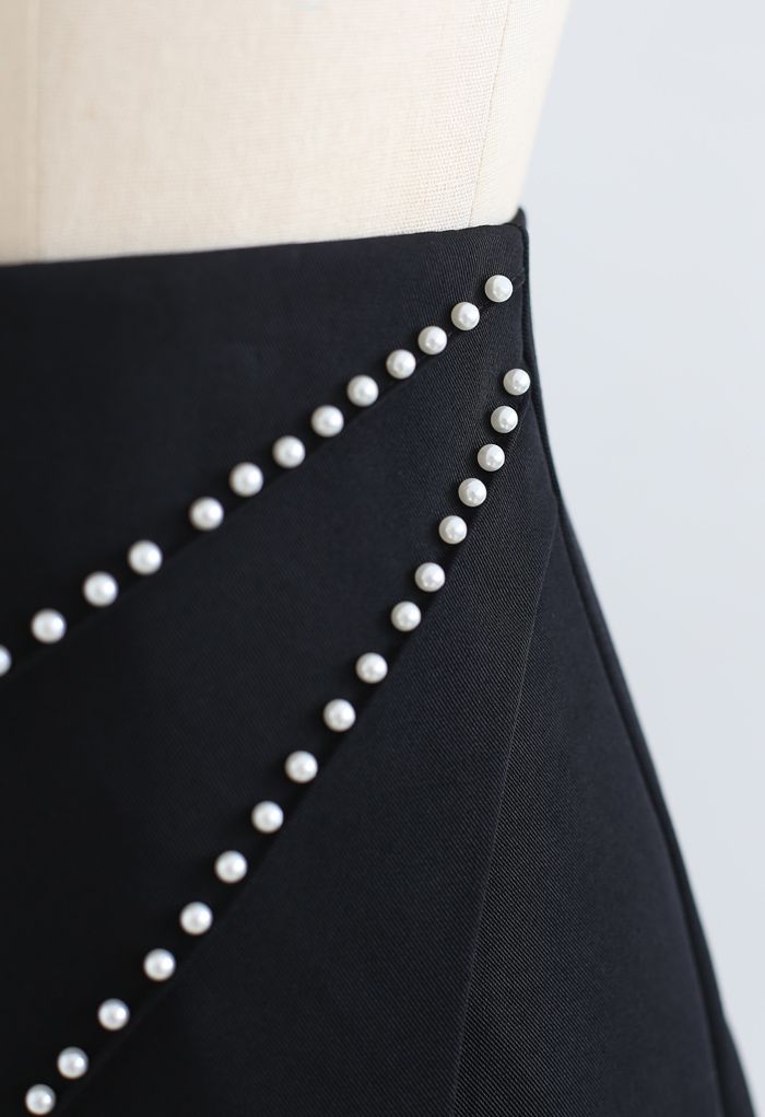 Pearls Embellished Flap Mini Skirt in Black