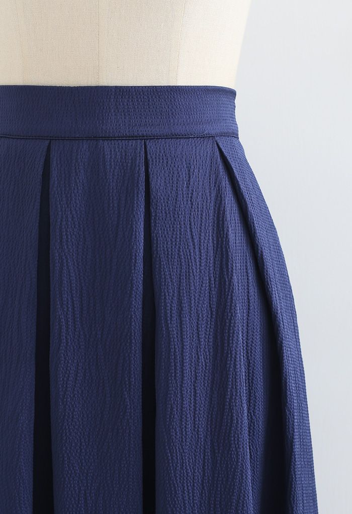 Polished Textured Pleated Midi Skirt in Navy