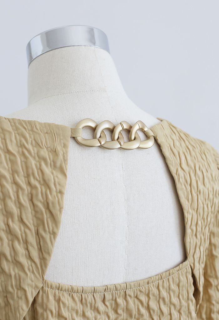 Golden Chain Detail Embossed Mini Dress in Mustard