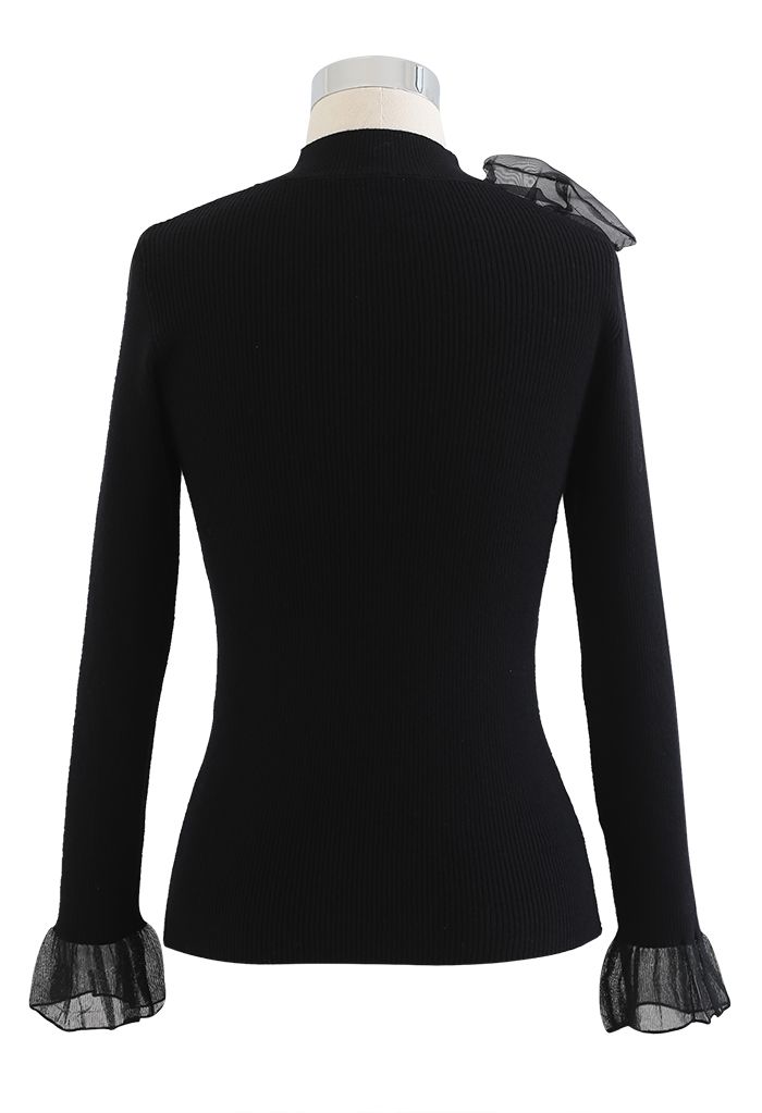 Sheer Side Bowknot High Neck Knit Top in Black