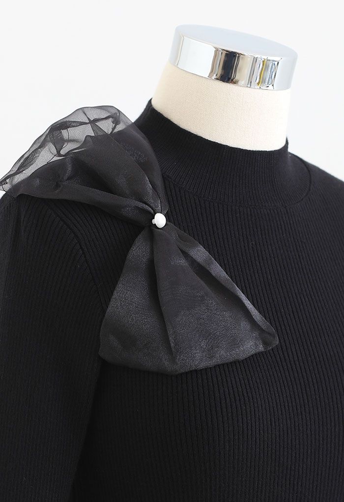 Sheer Side Bowknot High Neck Knit Top in Black