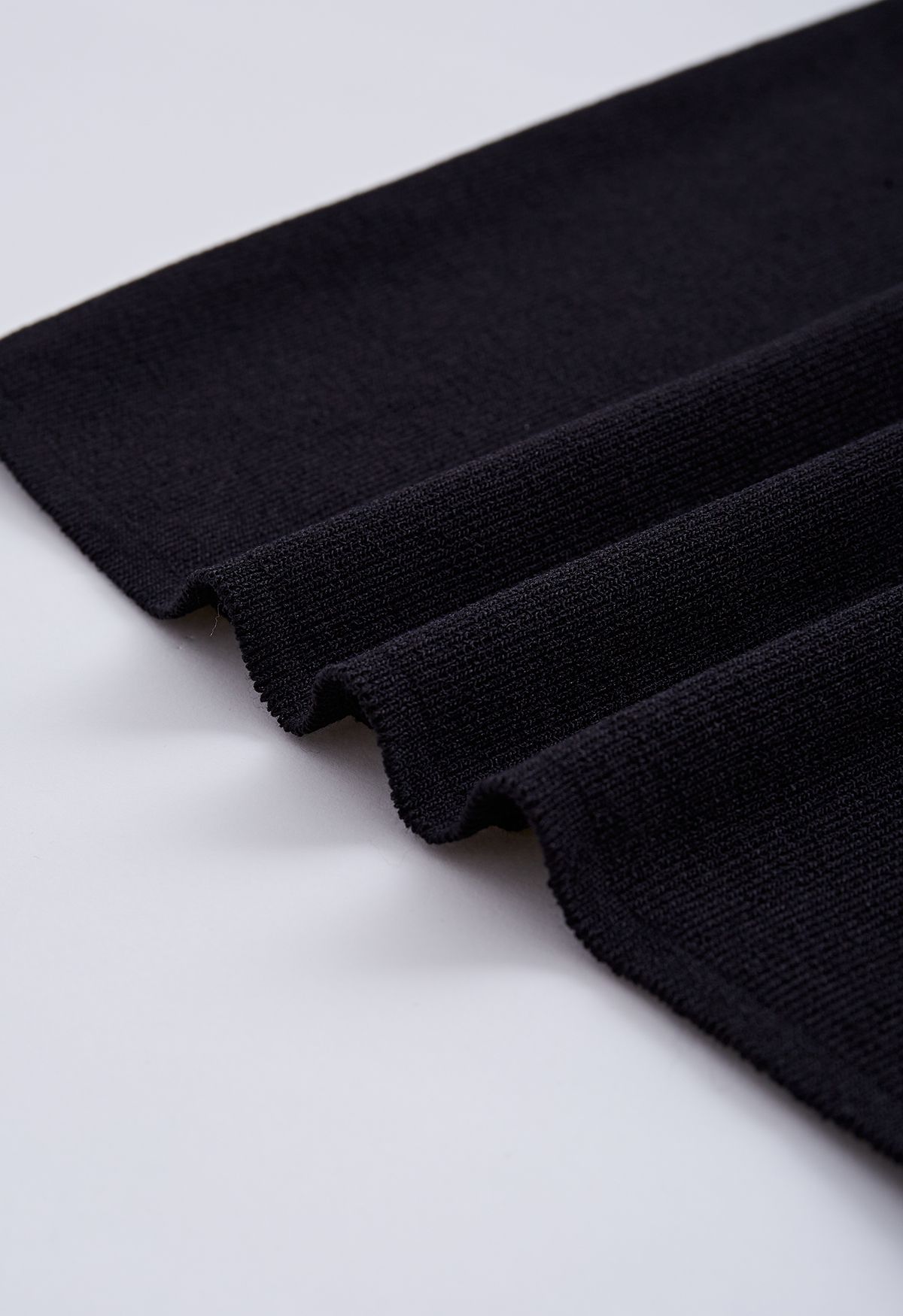 Spliced Ruched Off-Shoulder Knit Crop Top in Black