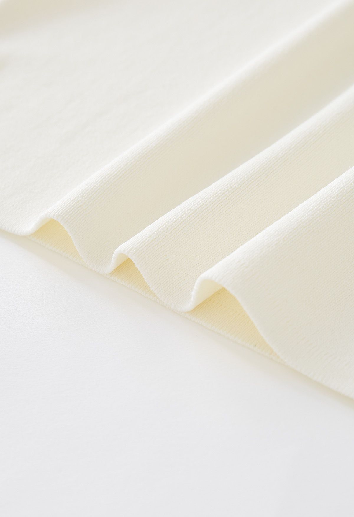 Off-Shoulder Sheer Sleeves Knit Crop Top in Cream