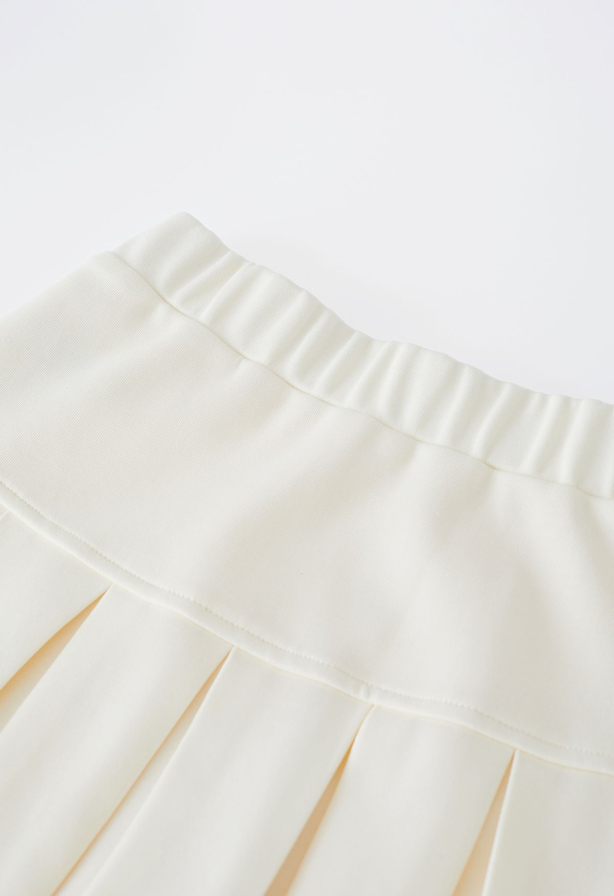 Elastic Waist Pleated Flare Mini Skirt in Cream