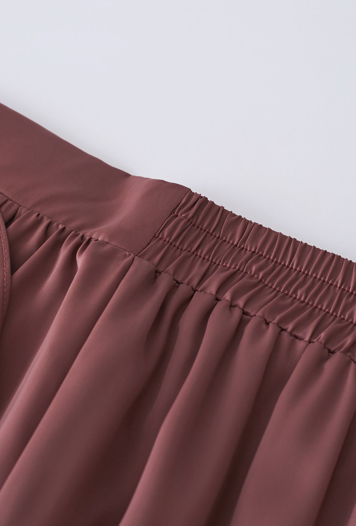 Ruffle Asymmetric Satin Midi Skirt in Rust Red