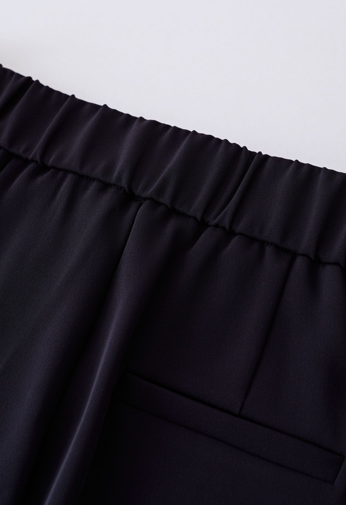 Belted Pleated Straight-Leg Pants in Black