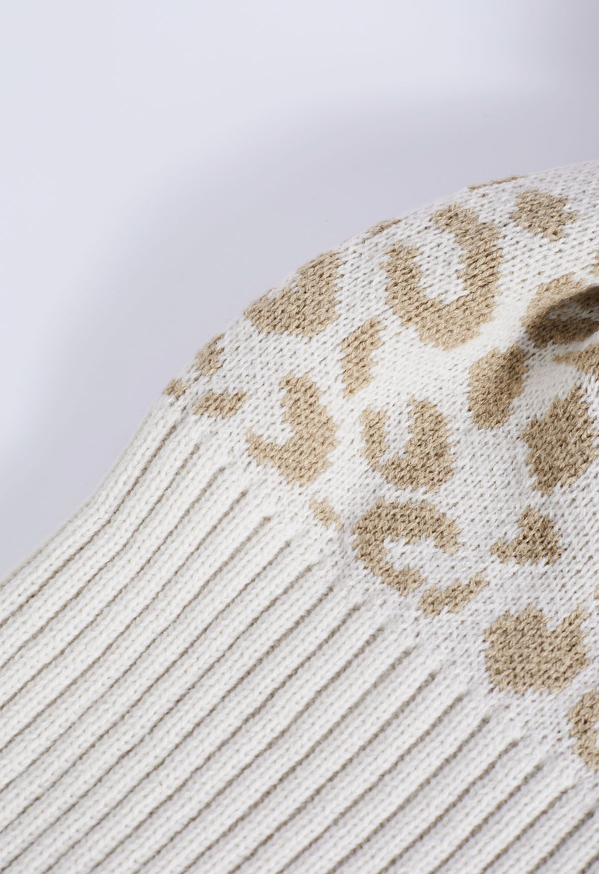 Fuzzy Pom-Pom Leopard Knit Beanie Hat in Oatmeal