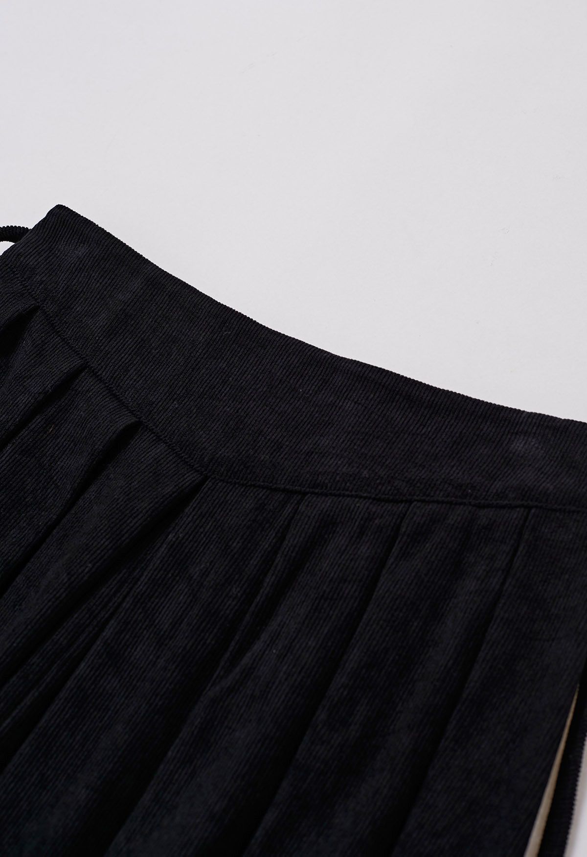 Tie-Waist Pleated Corduroy Midi Skirt in Black