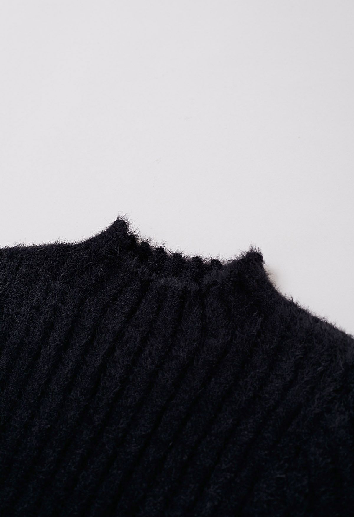 Mock Neck Fuzzy Rib Knit Top in Black