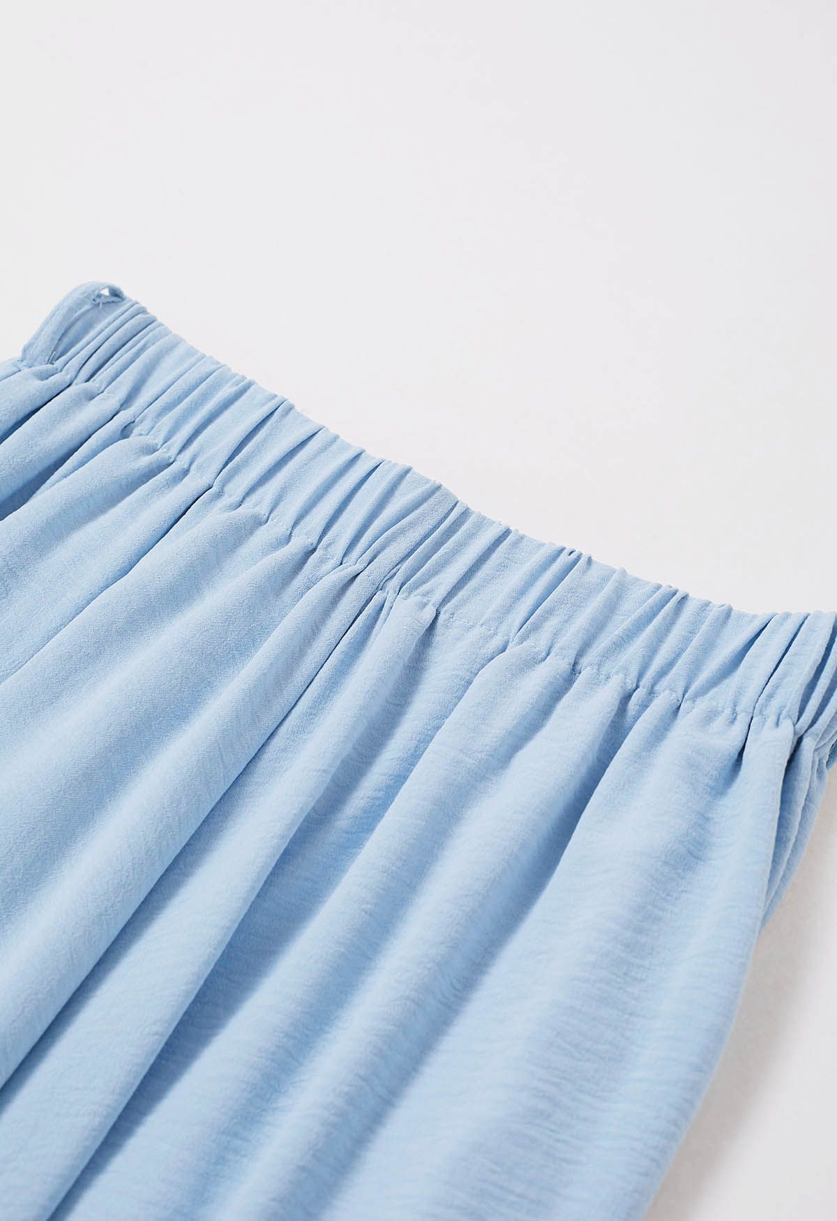 Breezy Tie Waist Asymmetric Crop Pants in Blue