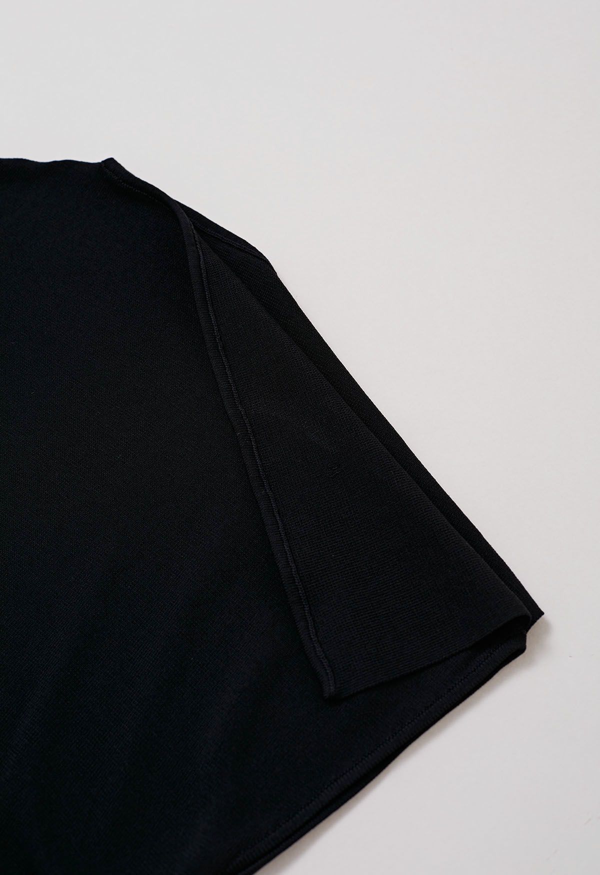 Asymmetric Folded Collar Knit Top in Black