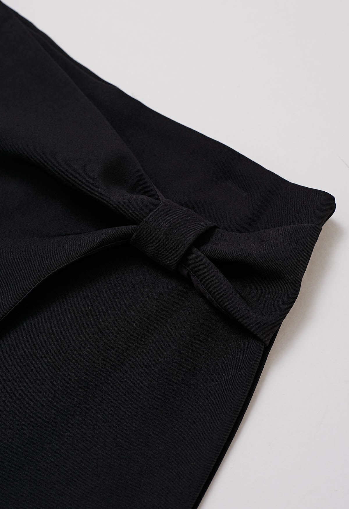 Graceful Bowknot Flap Mini Skirt in Black