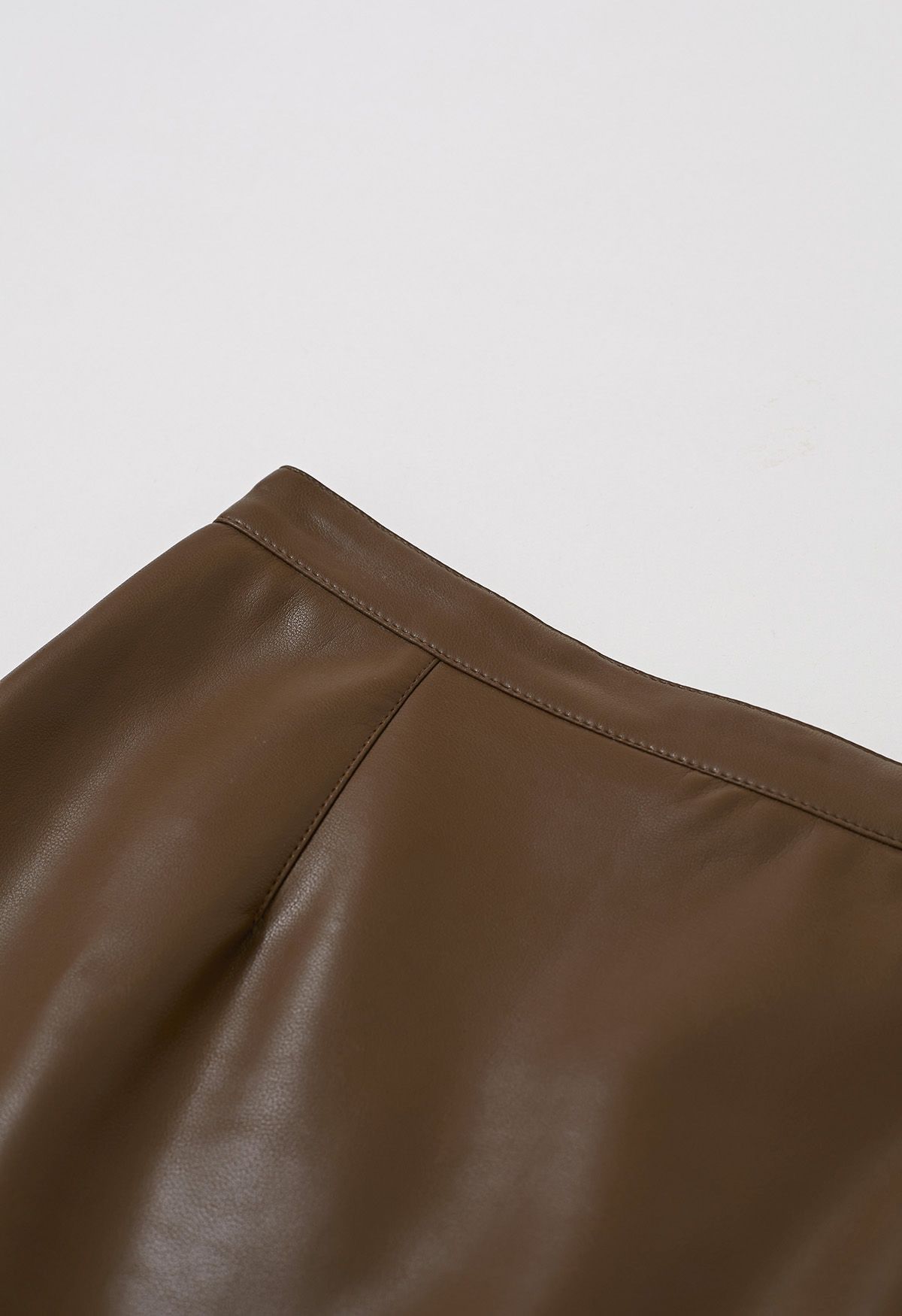 Smooth Silhouette Faux Leather Split Maxi Skirt in Brown