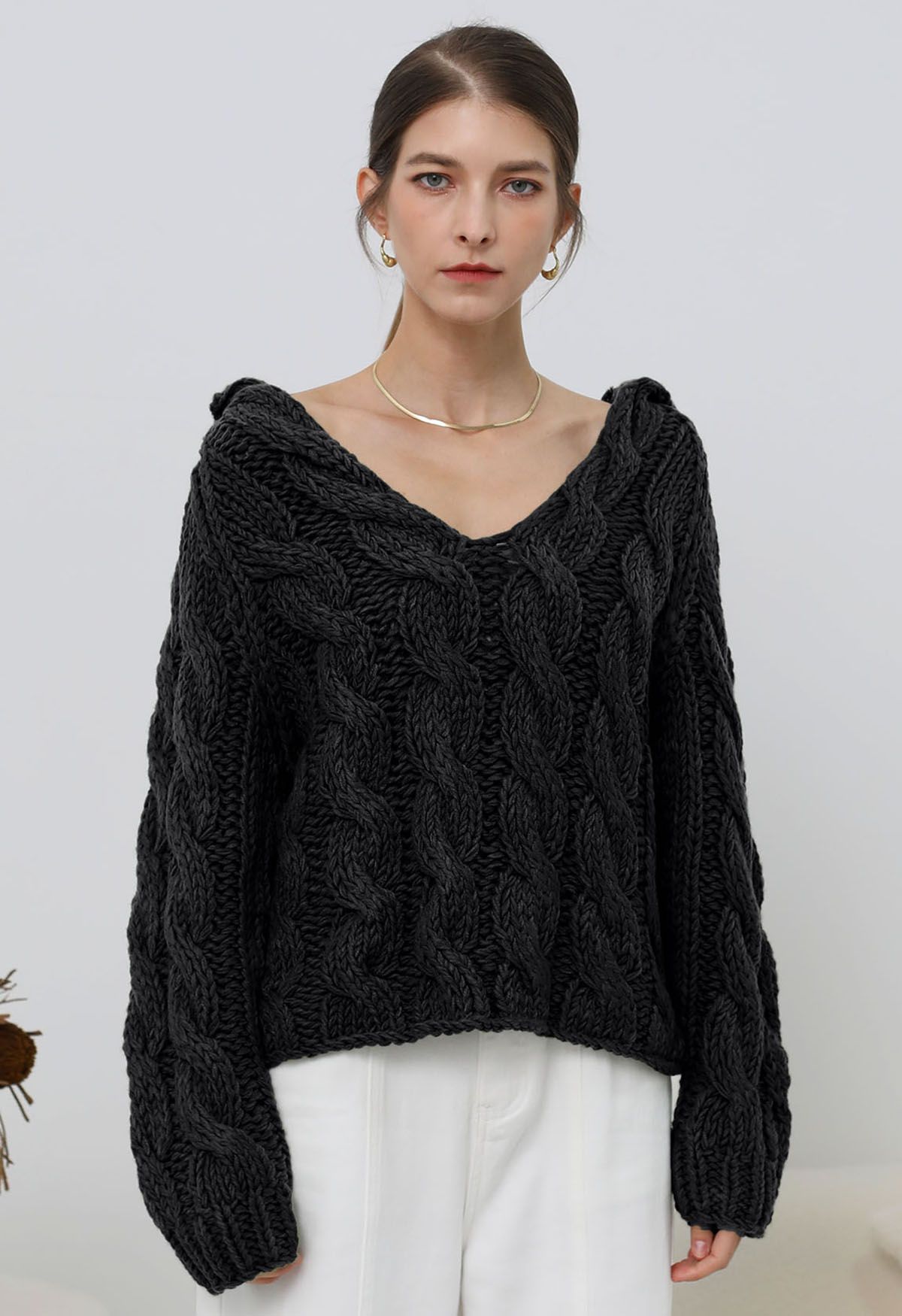 Collared V Neck Chunky Cable Knit Sweater in Black