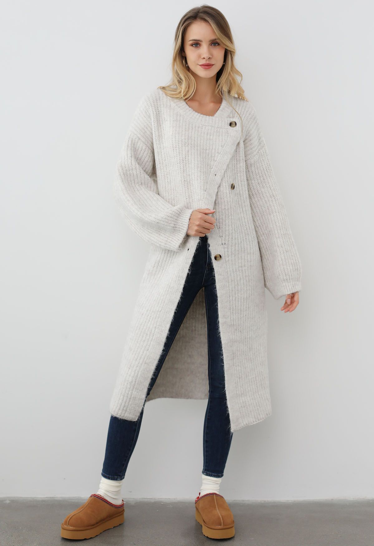 Warmth Wrapped Asymmetric Buttoned Knit Longline Cardigan in White