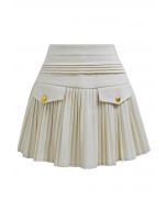 Golden Button Decorated Pleated Mini Skirt in Ivory